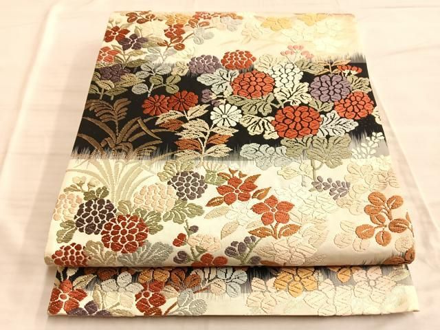 新品保管品】リバーシブル!? 袋帯 お値下げ中 六通 花模様 晒さ 茶系