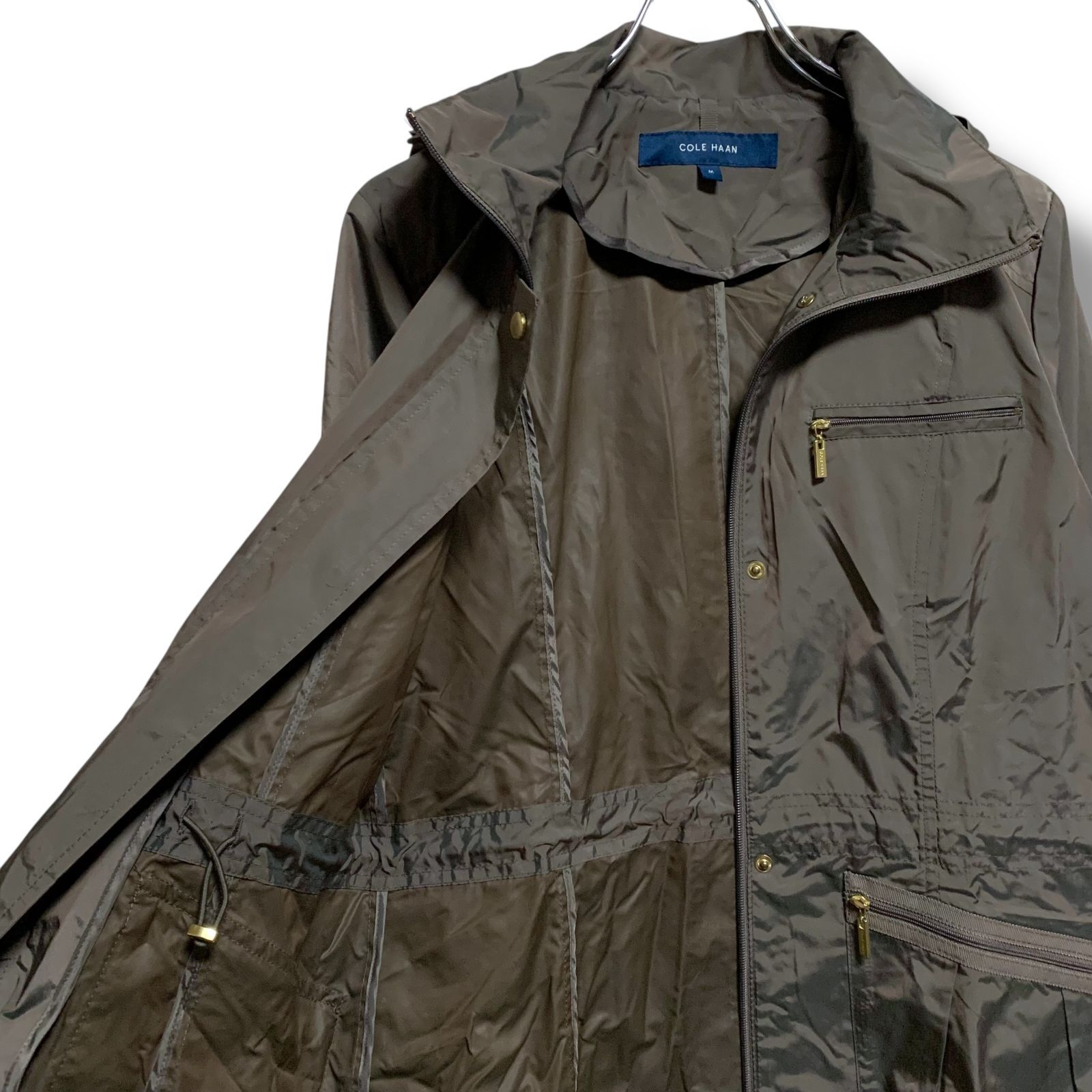 COLE HAAN コールハーン カーキブラウン パッカブルジャケット モッズコート ナイロン フード付き Mサイズ レディース 軽量 撥水 STORM CLOUD 収納袋付き アウトドア 春秋 001117H GULLKHAN_COM
