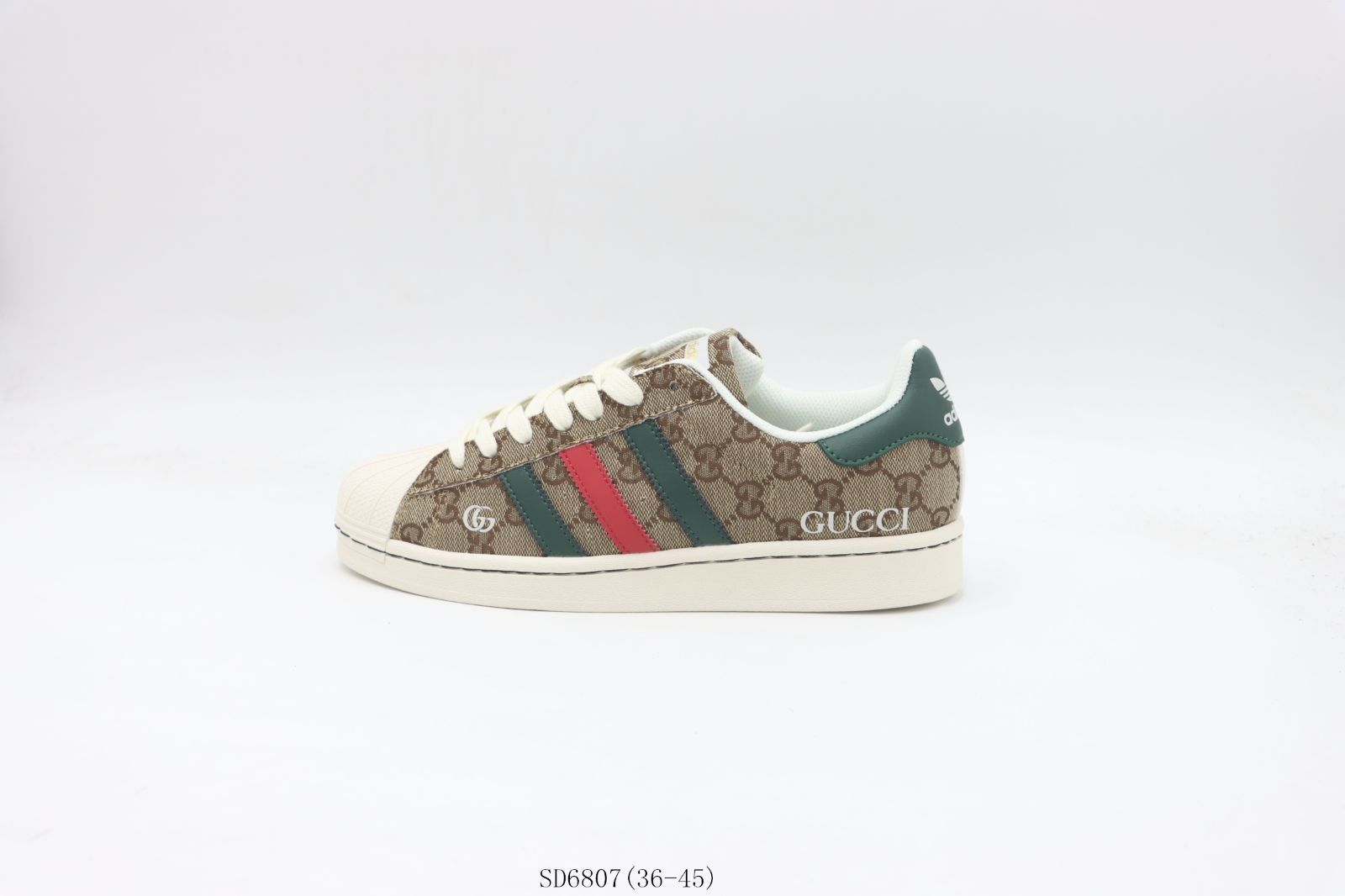 今日 Adidas アディダス クローバーシェルトゥースケートシューズ ブラウングリーングッチ SD6807-MM輸入1