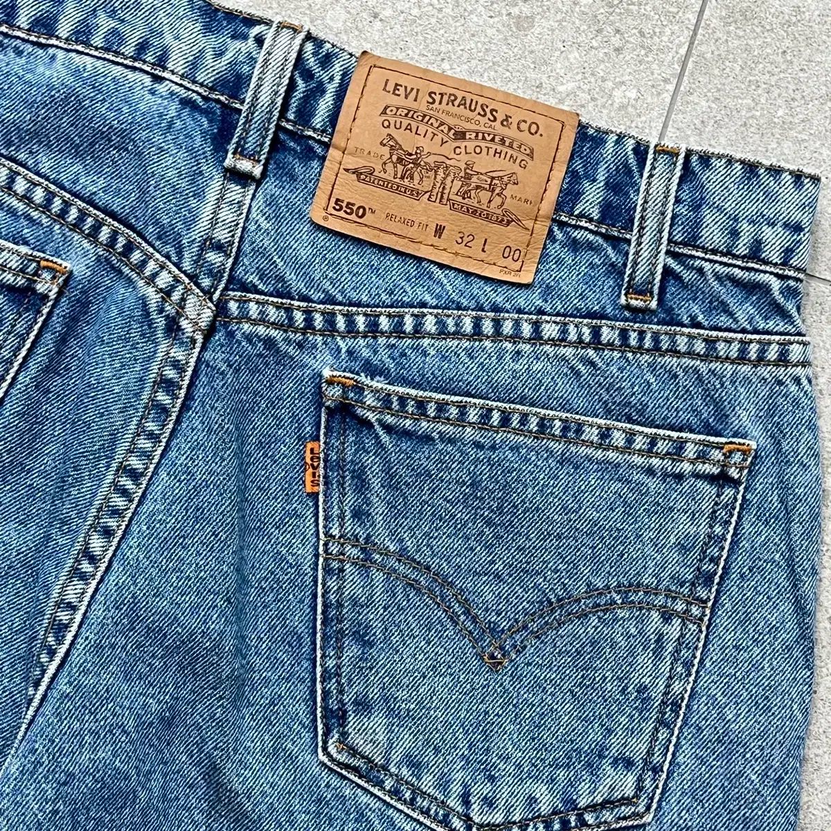 90年代 オレンジタブ Levi's リーバイス 550 テーパードデニムパンツ