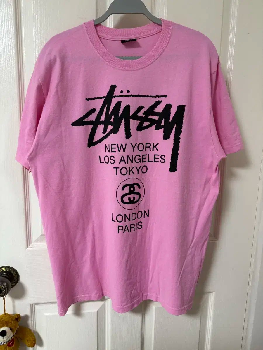 STUSSY(ステューシー) ワールドツアー Tシャツ ピンク L ピンクシャツ