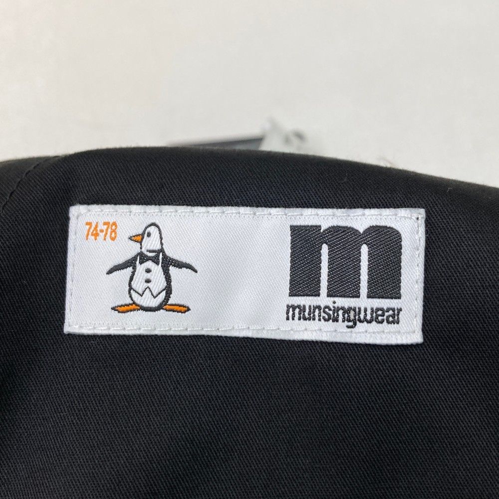 サイズ：74-78 MUNSING WEAR マンシングウェア 2023年モデル 2WAY ロングパンツ ロゴプリント  ブラック系 [240101431140] ゴルフウェア メンズ ストスト サイズ：74-78 MUNSING WEAR マンシングウェア 2023年モデル