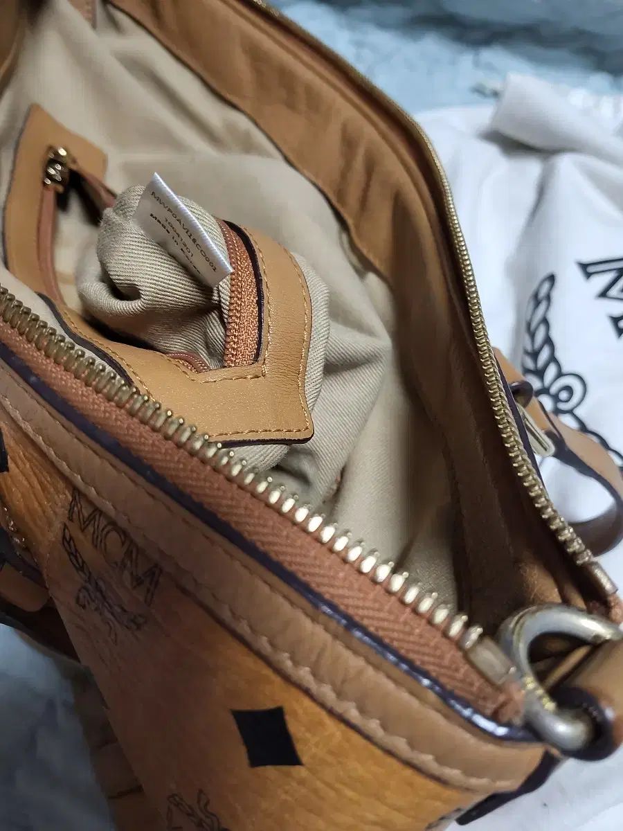 MCM ロゴプリント トートバッグ ブラウン MCM ロゴ トートバッグ ブラウン - メルカリ