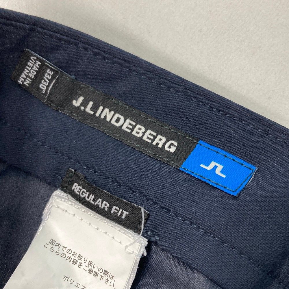 サイズ：33/30 J.LINDEBERG ジェイリンドバーグ  ロングパンツ サイドライン  ネイビー系 [240101466744] ゴルフウェア メンズ ストスト サイズ：33/30 J.LINDEBERG ジェイリンドバーグ ロングパンツ