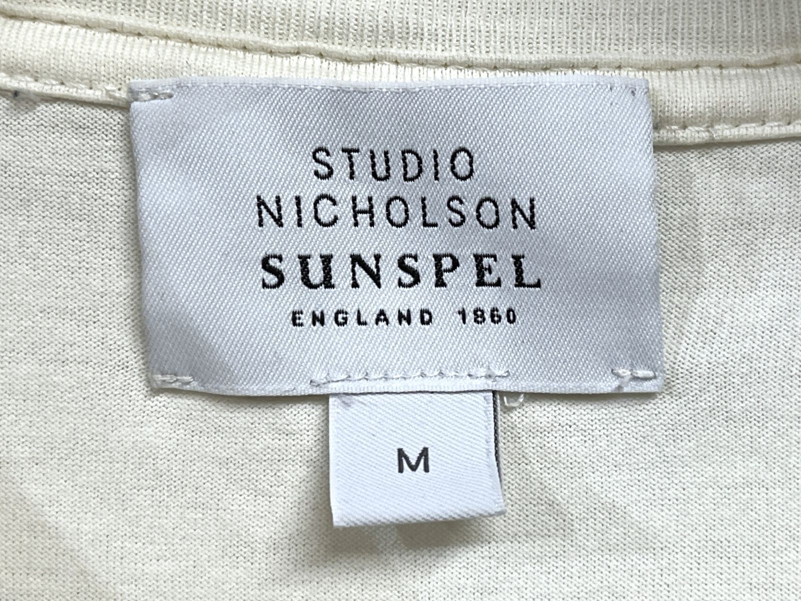 SUNSPEL × STUDIO NICHOLSON｜サンスペル スタジオニコルソン ロゴ 