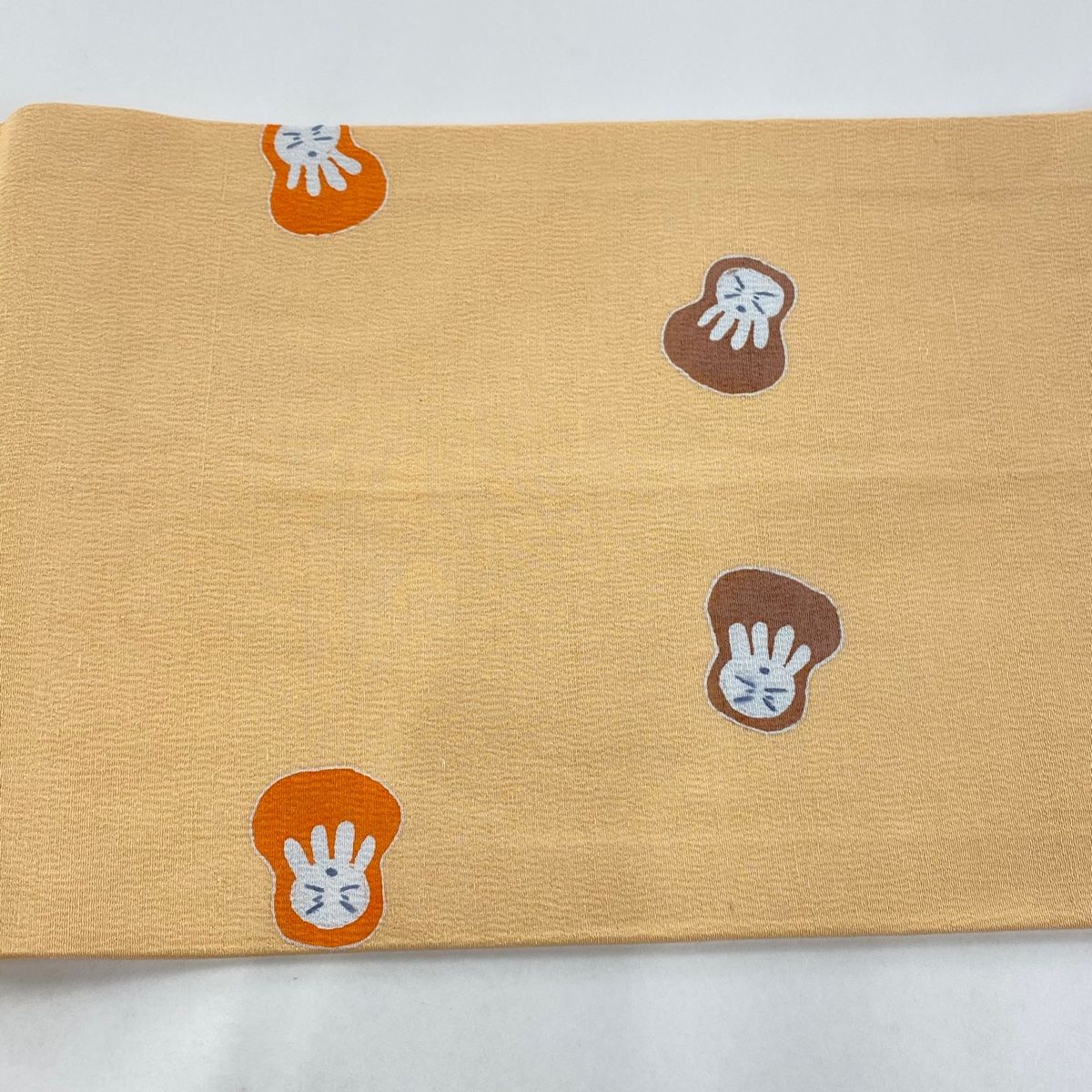 縮緬　ちりめん　生機　きばた　別織　瑞星 開き名古屋帯 美品 名品 落款 達磨 縮緬 薄オレンジ 正絹 【中古