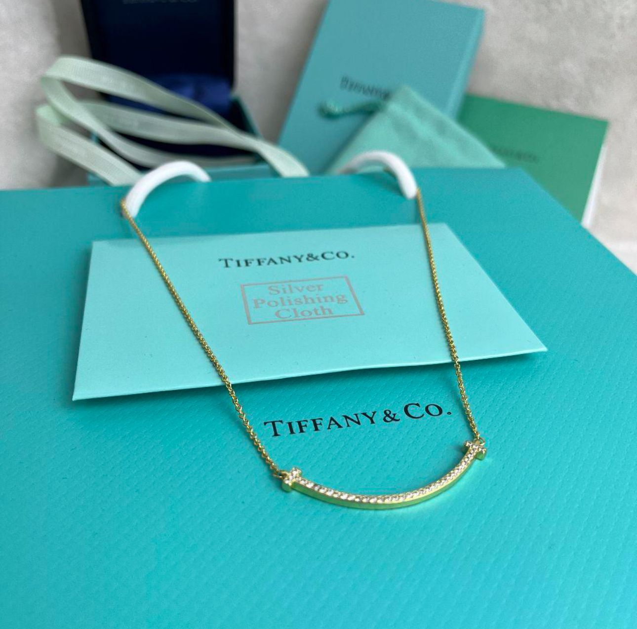 【美品】TIFFANY & Co.ティファニーT スマイル ネックレス  箱付き