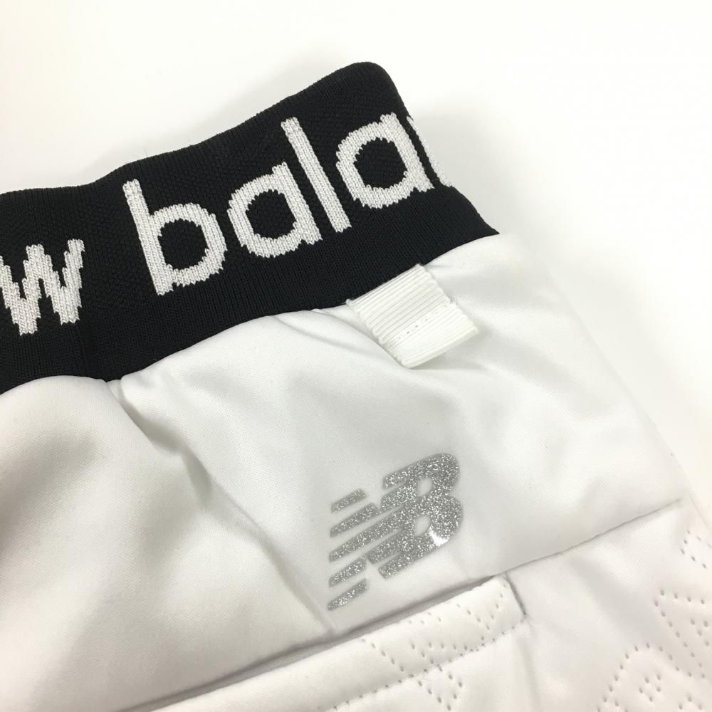 美品new balance ニューバランスロゴスカート Sサイズホワイト 超美品ニューバランスゴルフ スカート ライトグレー×黒 ロゴ地模様