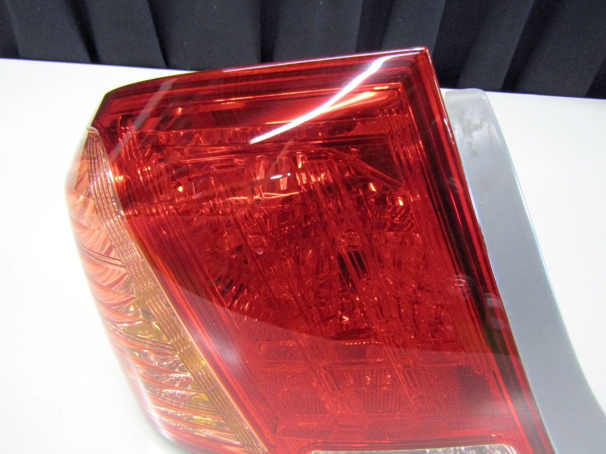アクシオ NZE141 前期 左テールランプ 12-512 ジャンク品 カローラ