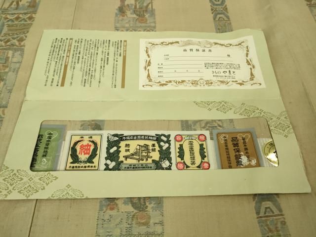 平和屋着物□極上 本場眞綿結城紬 壁画文様 やまと誂製 証紙付き 逸品  