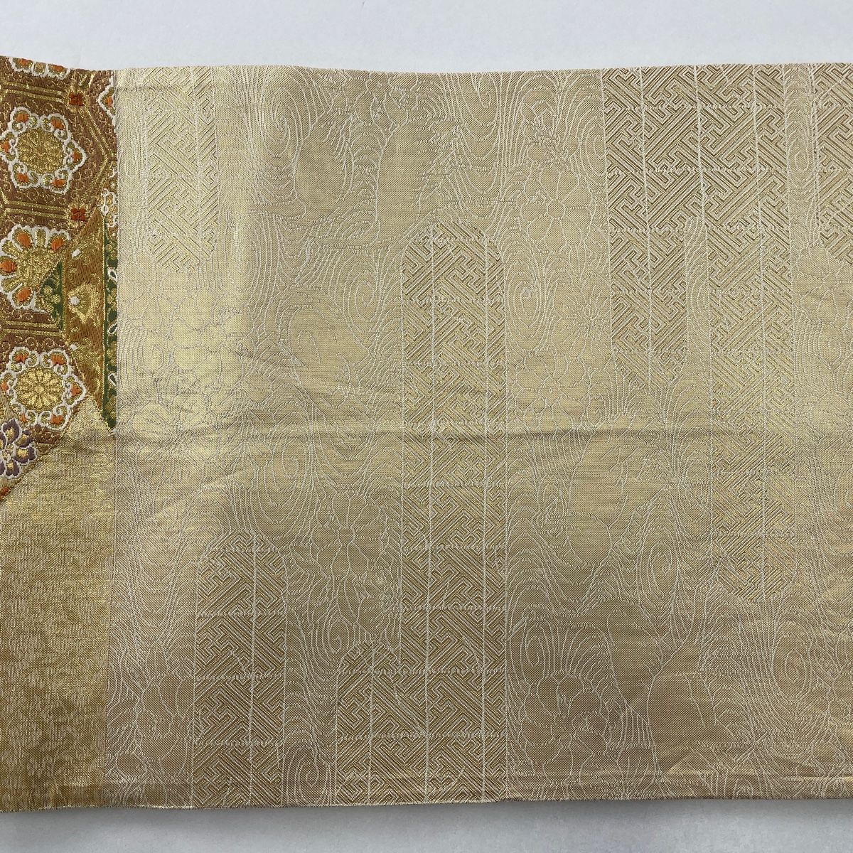 ムガシルク 金彩花唐草ライトベージュ全通柄 名古屋帯 (袋帯としても)極美品 袋帯 秀品 華文 花喰い鳥 箔 金糸 ベージュ 六通 正絹 【中古】 袋帯