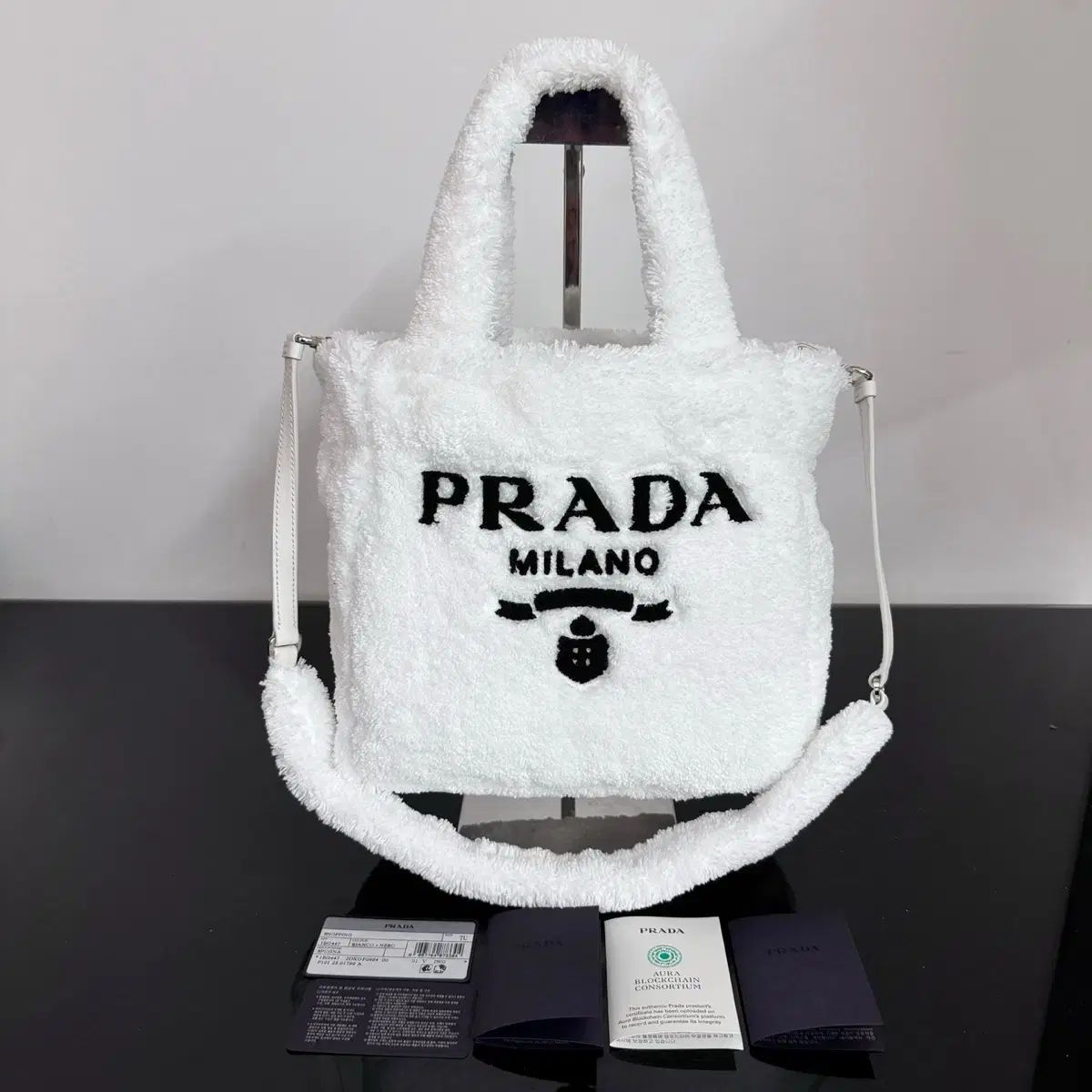 雷市場（ポンジャン）商品韓国直送】ほぼ新品 PRADA(プラダ) テリー ミニ トートバッグ ホワイト - メルカリ