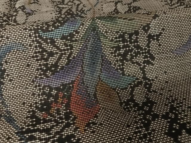 平和屋着物○本場大島紬 純泥染 手織 9マルキ 更紗花文 興紬商店謹製