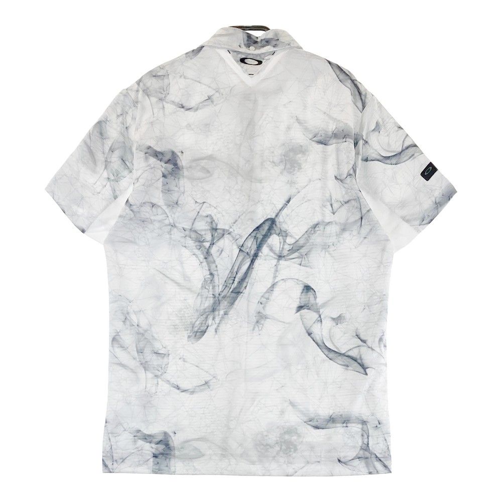 新品　OAKLEY SKULL メンズ総柄ポロシャツ サイズ：XL OAKLEY オークリー 半袖ポロシャツ ボタンダウン スカル