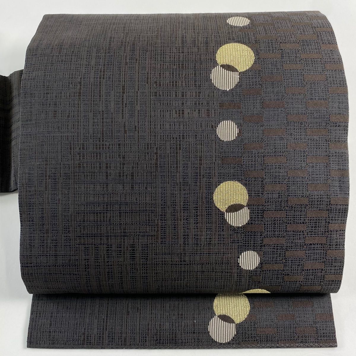 名古屋帯 秀品 丸紋 幾何学 箔 焦茶色 正絹