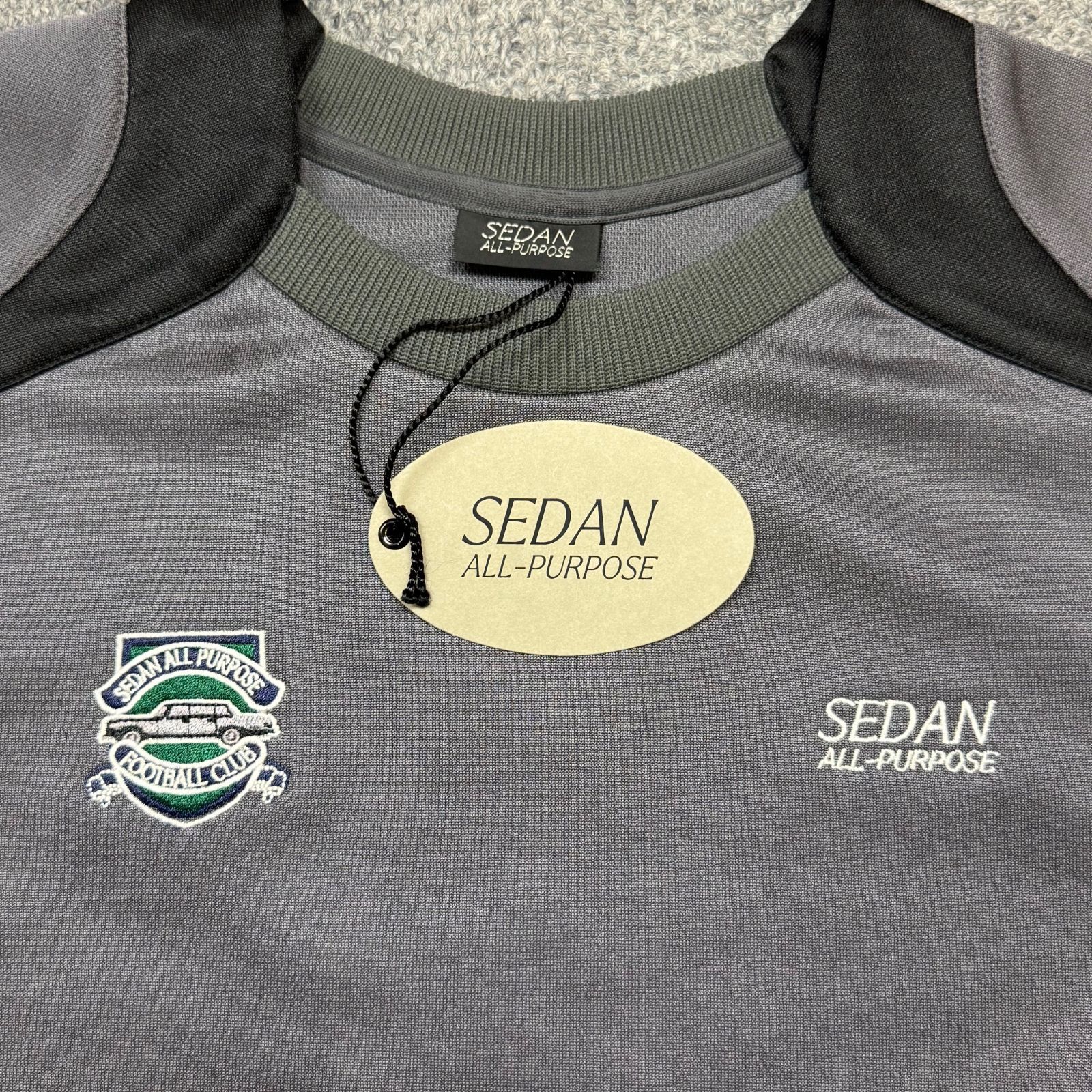 参考上代23100円 未使用品 SEDAN ALL-PURPOSE 24AW TEAM TRAINING TOP 