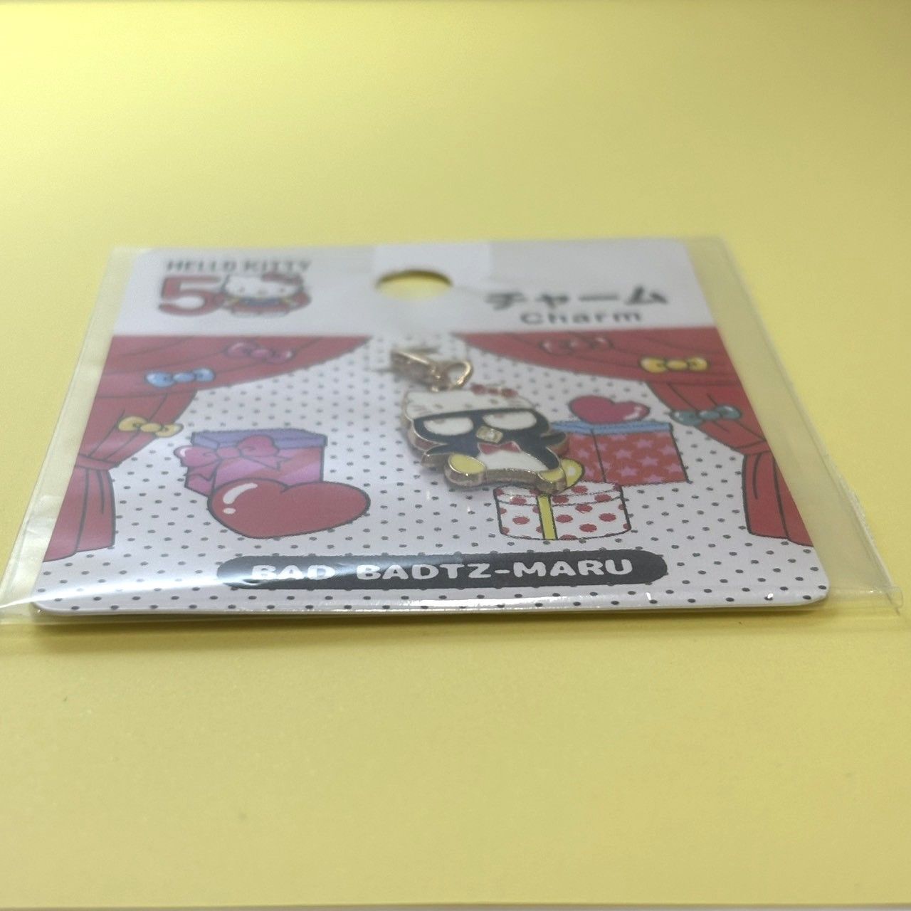i177【新品・未使用品】ハローキティ50th バッドばつ丸 チャーム