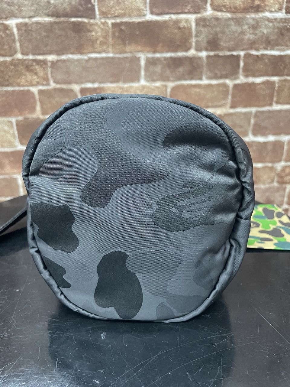 バッグ BAPE PORTER SOLID CAMO DRAWSTRING BAG A BATHING APE（アベイシングエイプ）の「PORTER SOLID CAMO