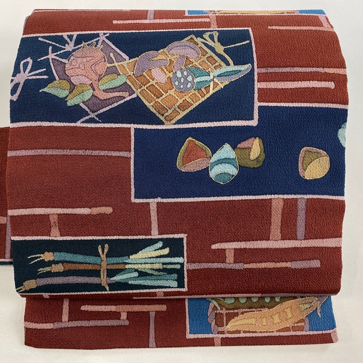 名古屋帯 秀品 成尾の 蟹 縮緬 金彩 茶色 正絹