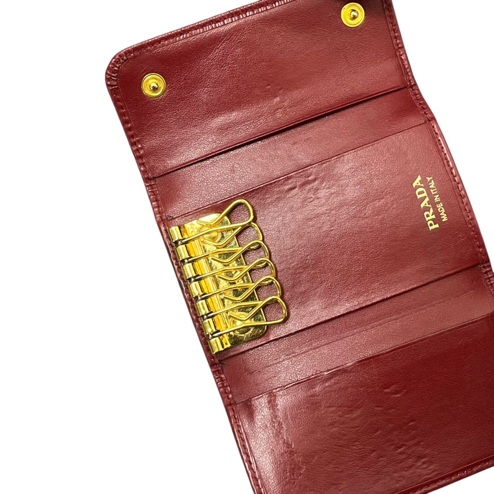 PRADA キーケース 赤 レザー 6連ゴールド金具 楽天市場】PRADA プラダ レザー6連キーケース型押し