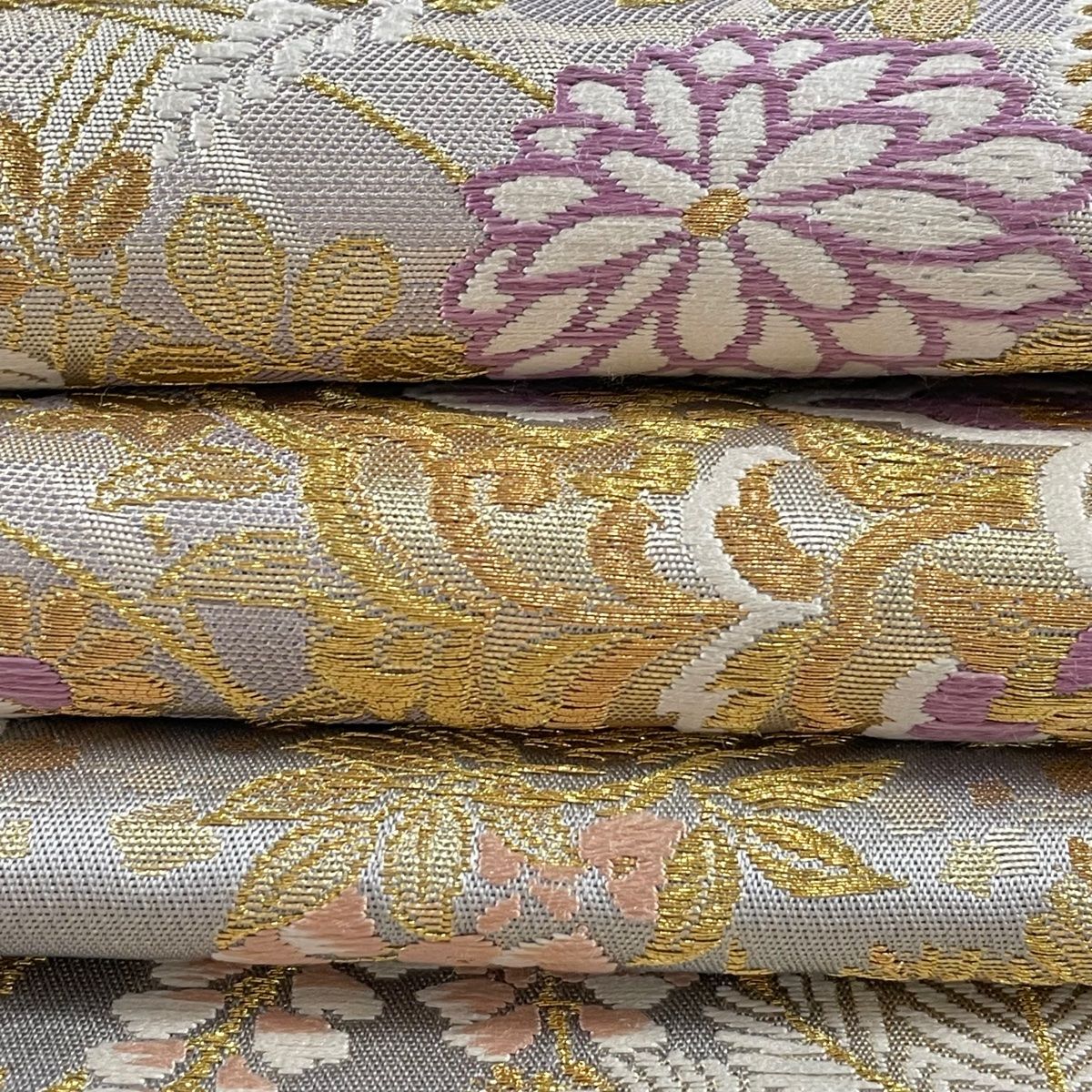 袋帯 美品 逸品 じゅらく 落款 じゅらく帝王紫 華文 草花 金糸