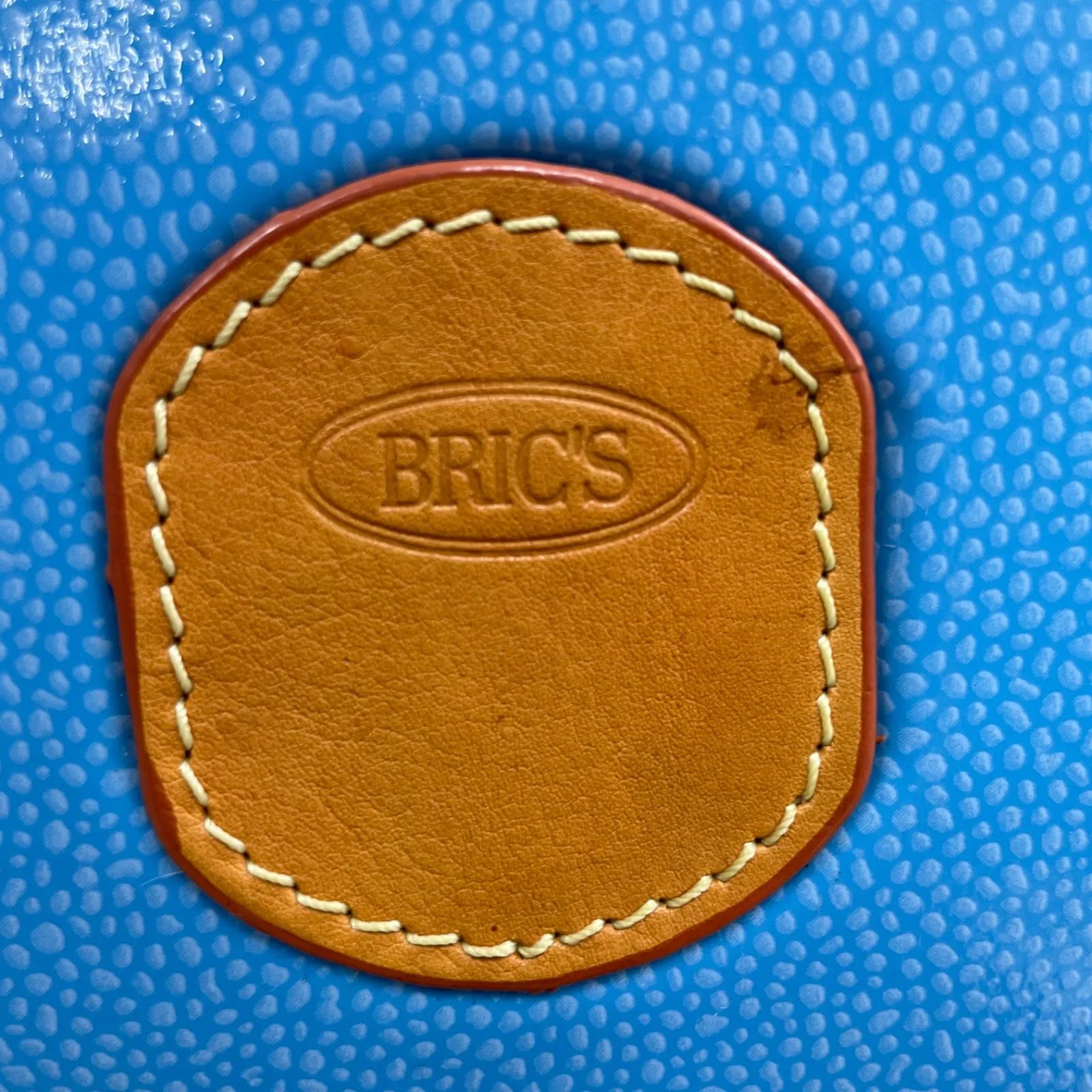 樹脂×レザー スーツケース