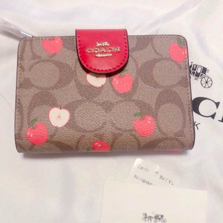 新品 コーチ COACH シグネチャー アップルプリント 二つ折り財布