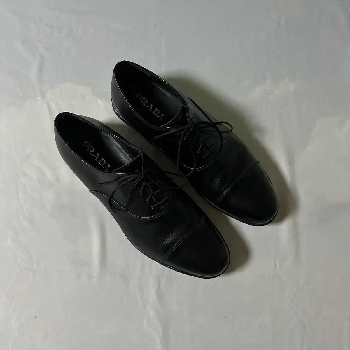 Prada sports cap toe derby shoes