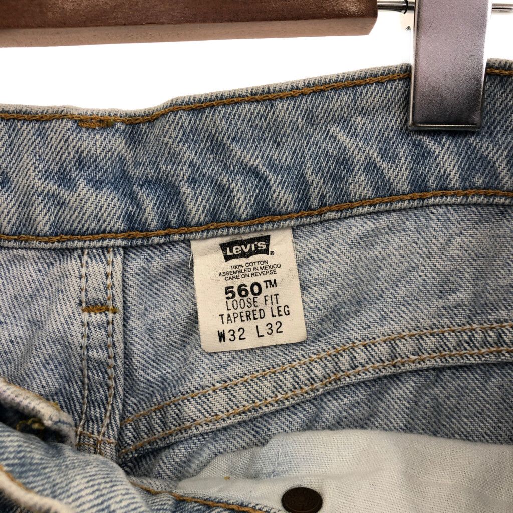 90年代 Levi's リーバイス 560 テーパード デニムパンツ ボトムス アメカジ ブルー (メンズ 32×32) 中古 古着 P6943