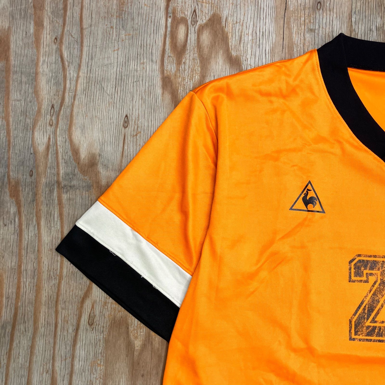 le coq sportif ルコックスポルティフ ゲームシャツ Vネック オレンジ