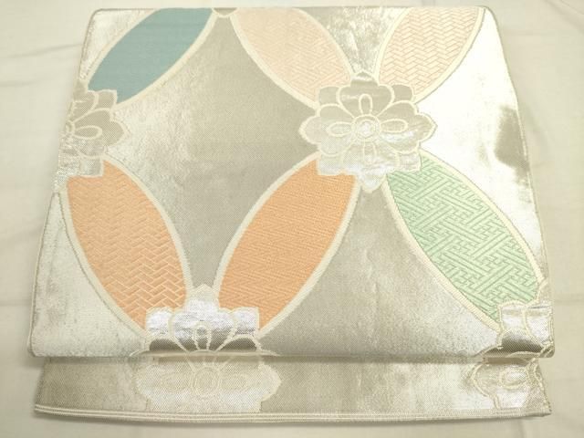 正絹 唐織 七宝文様 クリーム色 六通柄袋帯 美品 正絹 唐織 七宝文様 クリーム色 六通柄袋帯 美品 - メルカリ