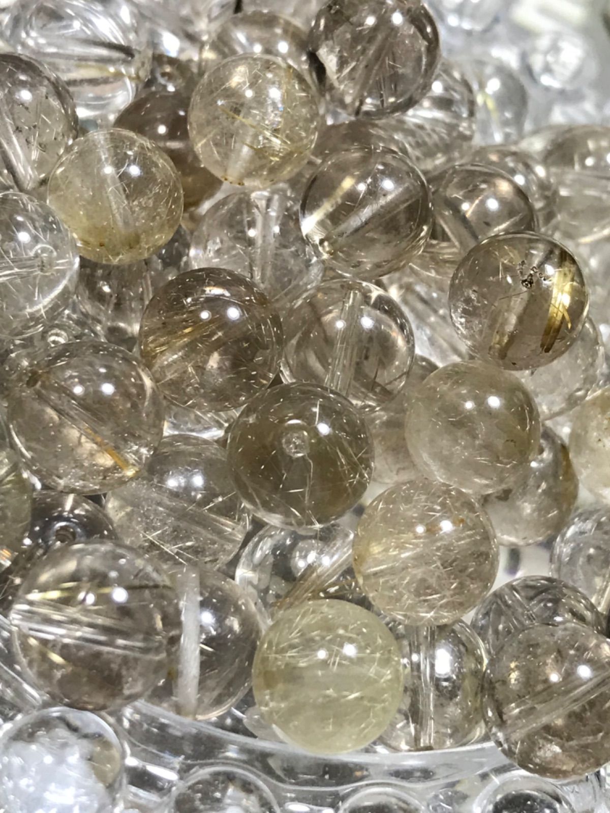 ◇10mm玉【ルチルクォーツ/金針水晶】1mm穴パーツ50個 - メルカリ