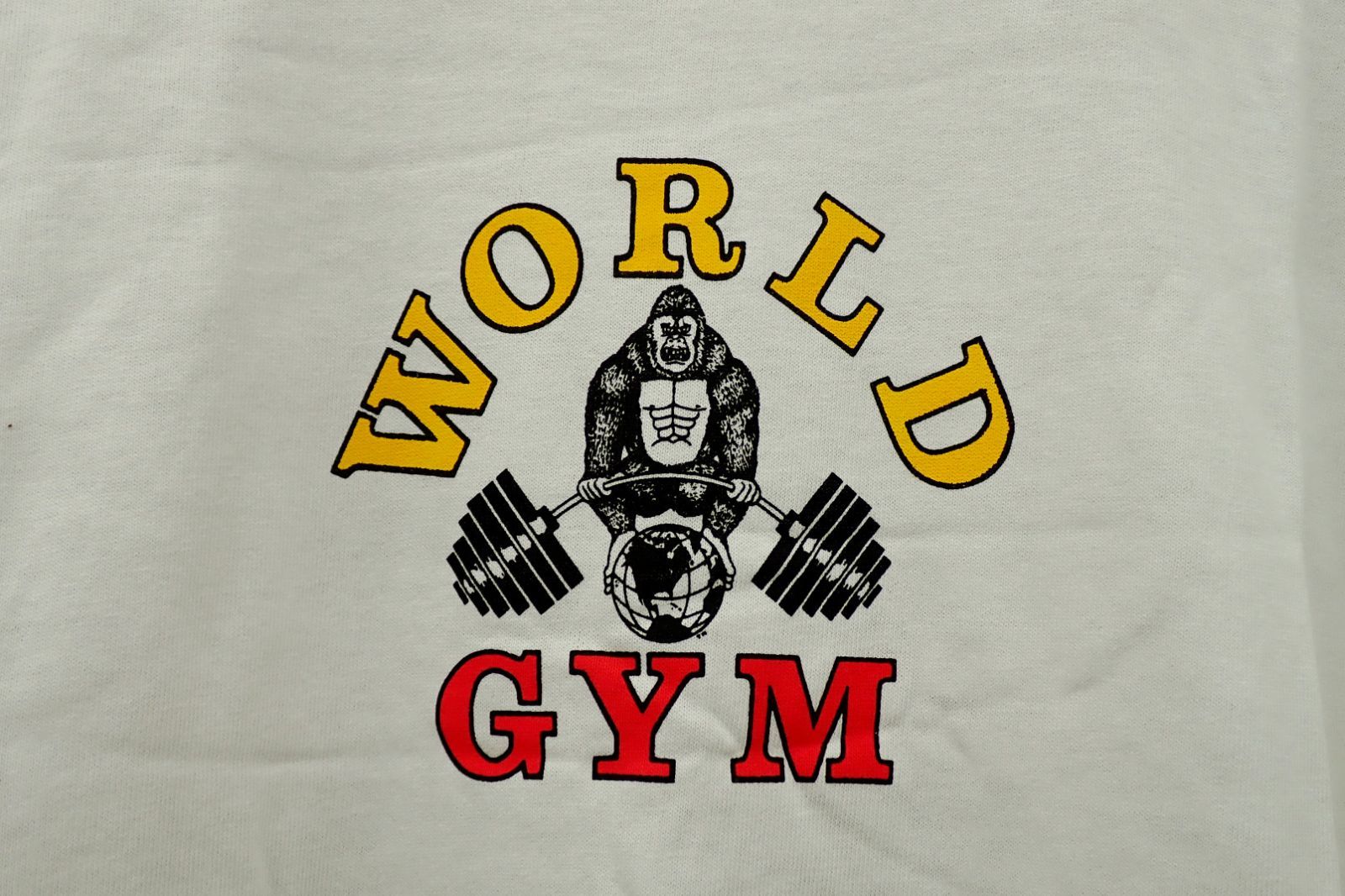 △衣類10 world gym 90s USA製 ワールドジム ゴリラ 白 Tシャツ 