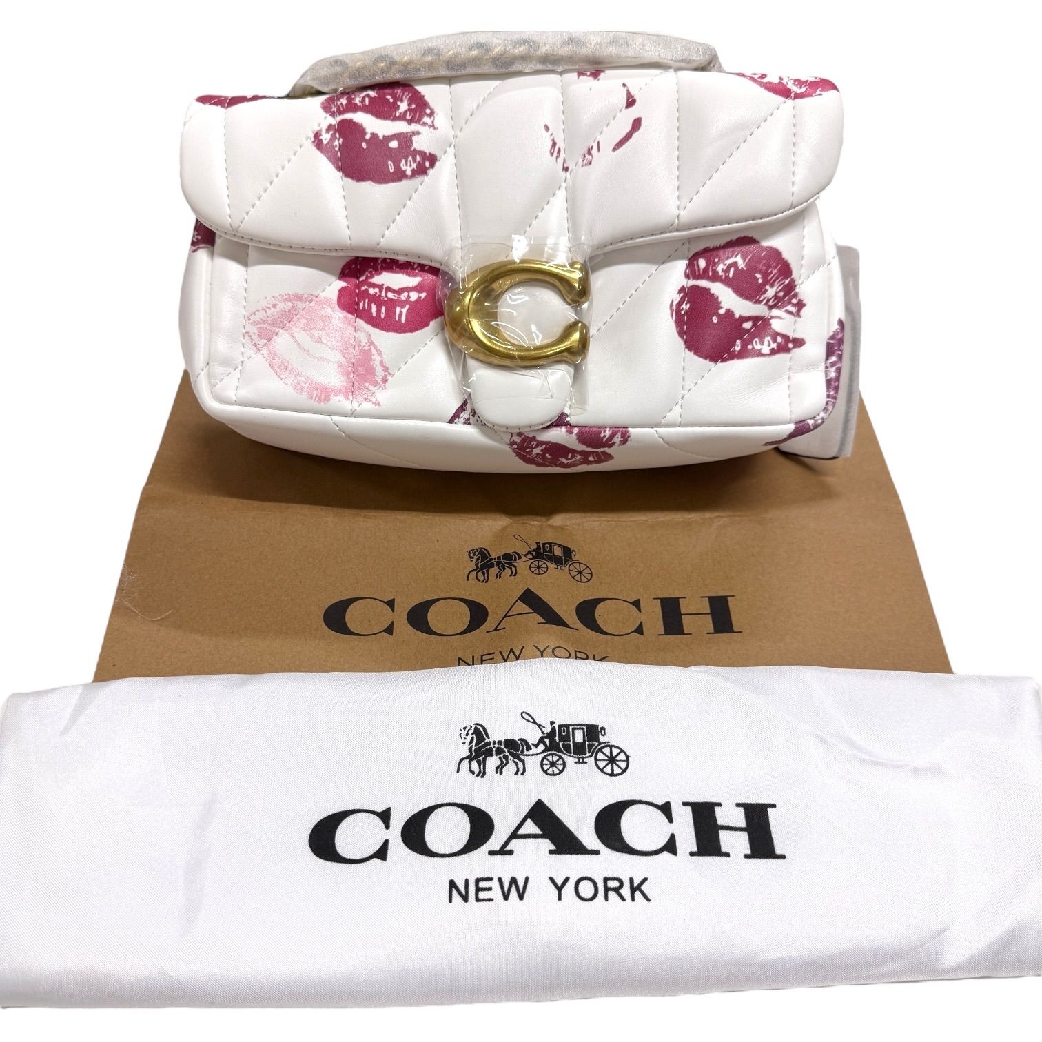 新品未使用】COACH コーチ リッププリント タビー tabby