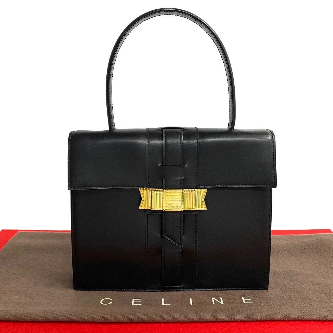 極 美品 CELINE セリーヌ ヴィンテージ リボン ロゴ 金具 カーフ レザー 本革 ハンドバッグ ミニ トートバッグ ブラック 黒 03-10  - メルカリ