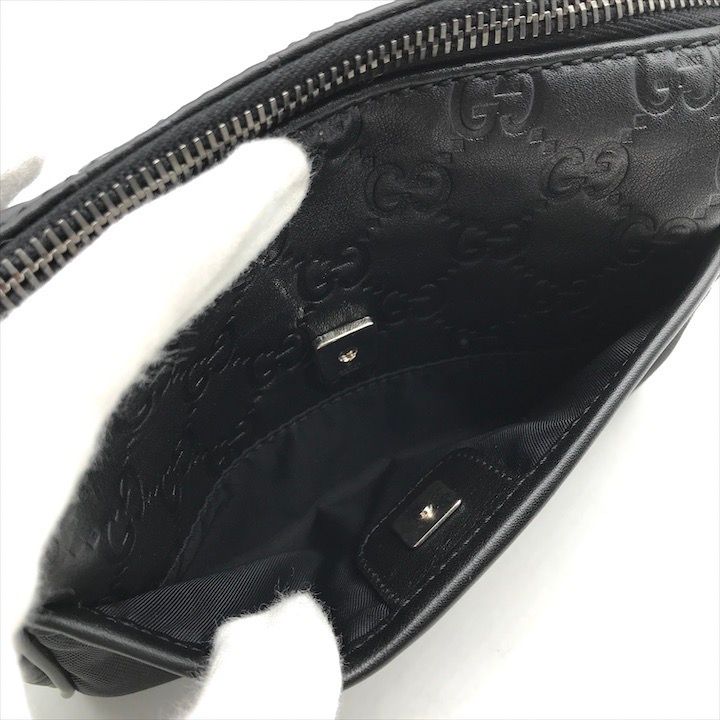 【美品】Gucci ブラックレザー ポーチGUCCIバッグ袋オマケ 展示品 GUCCI グッチ ロゴ金具 シマ ポーチ 小物入れ ブラック