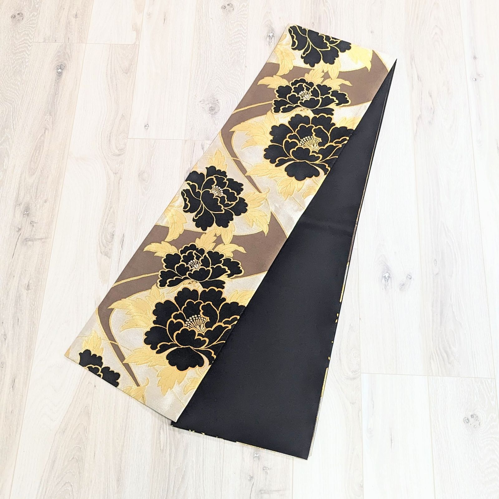 新品・仕立て上がり】正絹 袋帯 フォーマル 椿 黒 金 ゴールド  