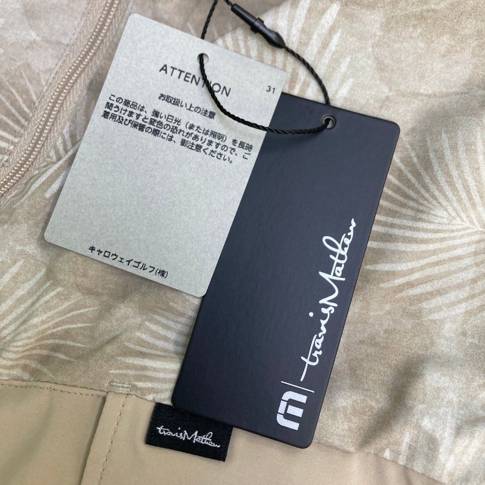 サイズ：L TRAVIS MATHEW トラビスマシュー  2WAYウインドブレーカー  カーキ系 [240101460610] ゴルフウェア メンズ ストスト サイズ：L TRAVIS MATHEW トラビスマシュー 2WAYウインド