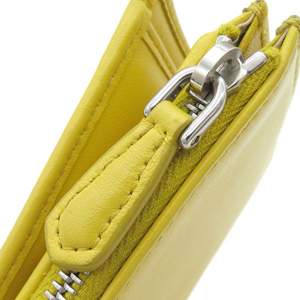 プラダ 二つ折り財布 グレーストライアングル エンボスレザー 1ML050 