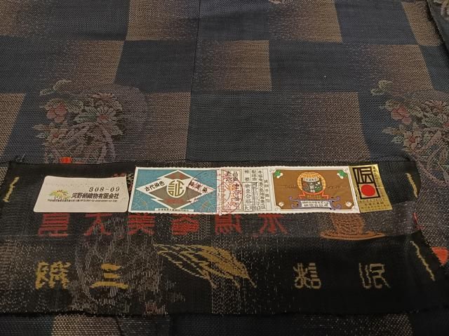 平和屋着物○本場大島紬 純泥染め 9マルキ 手織り 飾花文 河野絹織物  