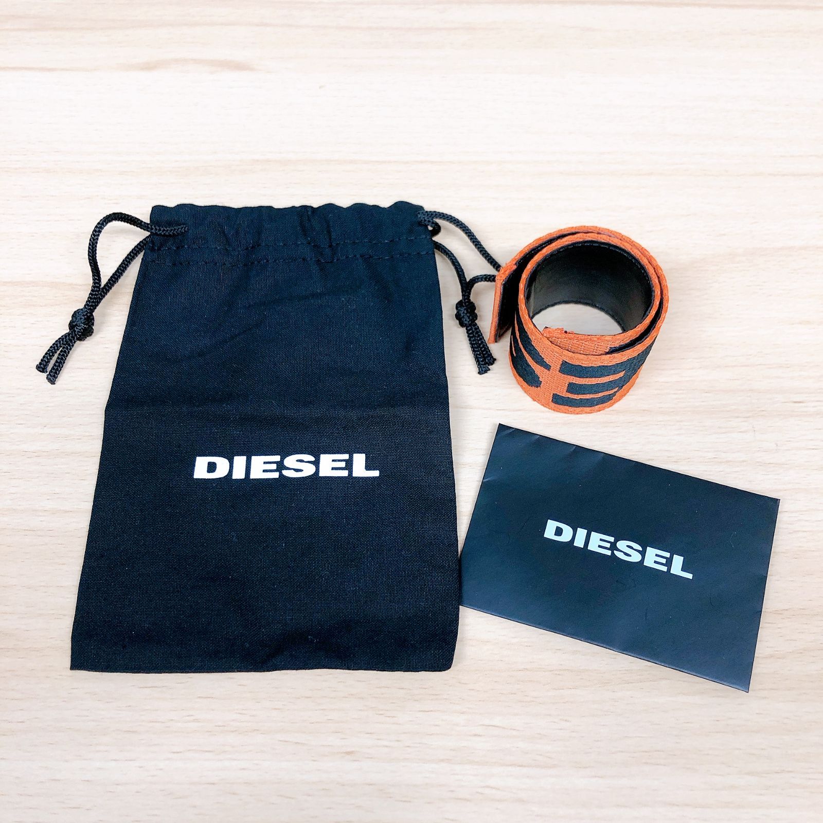 DIESEL リストバンド オレンジ ディーゼル 巾着付き 巻きつくリスト 