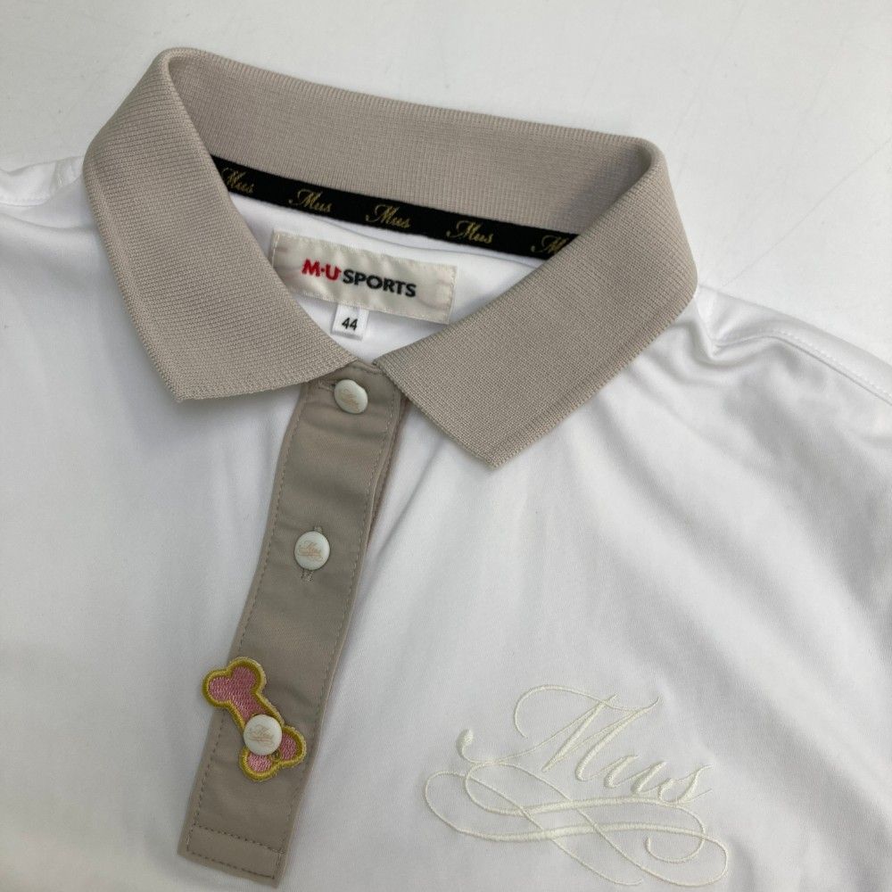 夏帯 羅 名古屋帯 オレンジ 銀色の渦巻き模様