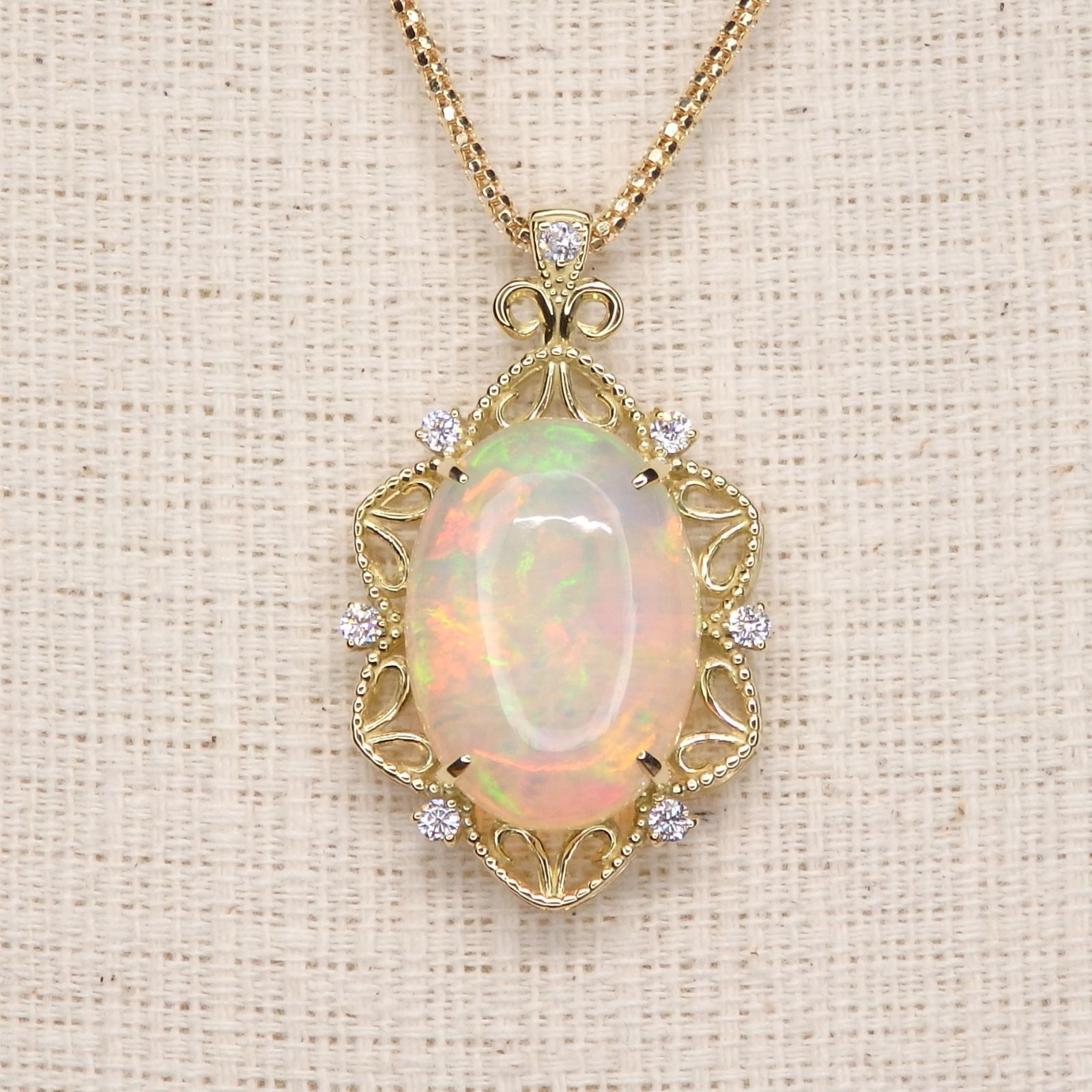 K18 ゴールド オパール ペンダントトップ 5.38ct D0.17ct Z5377
