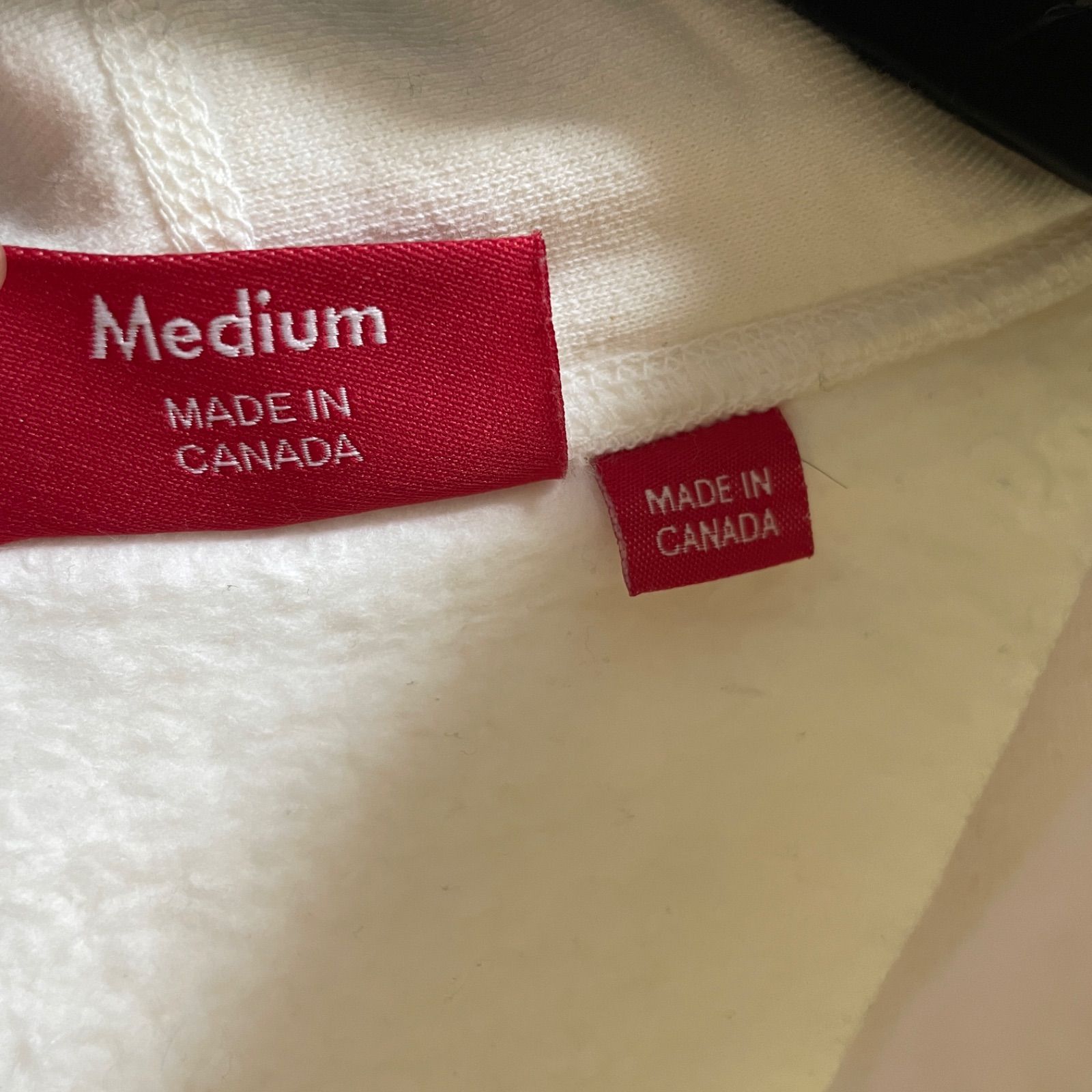 SUPREME スワロフスキー ホワイト パーカー size:M A63 - メルカリ