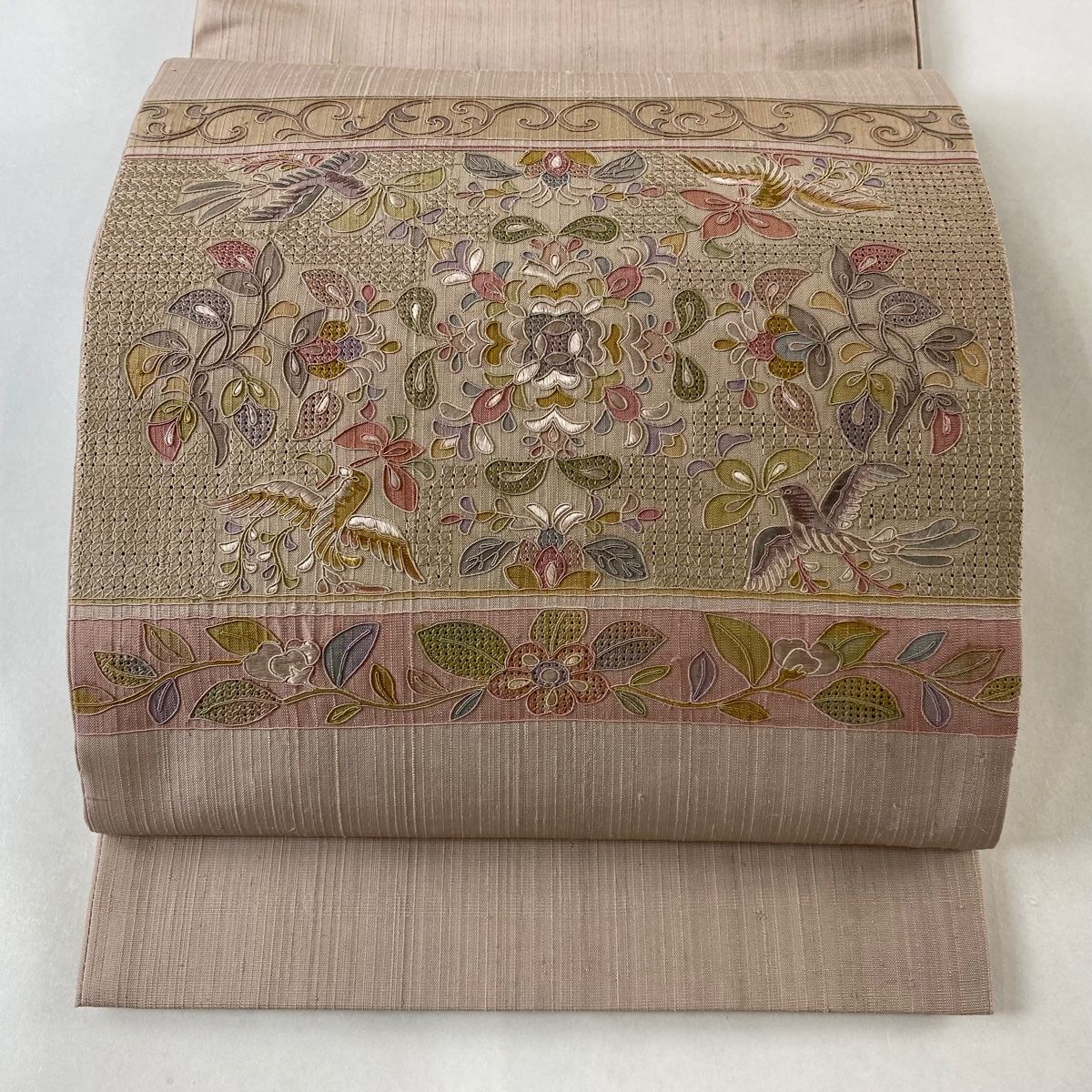 袋帯 名品 紬地 草花 花喰い鳥 刺繍 薄小豆 お太鼓柄 正絹
