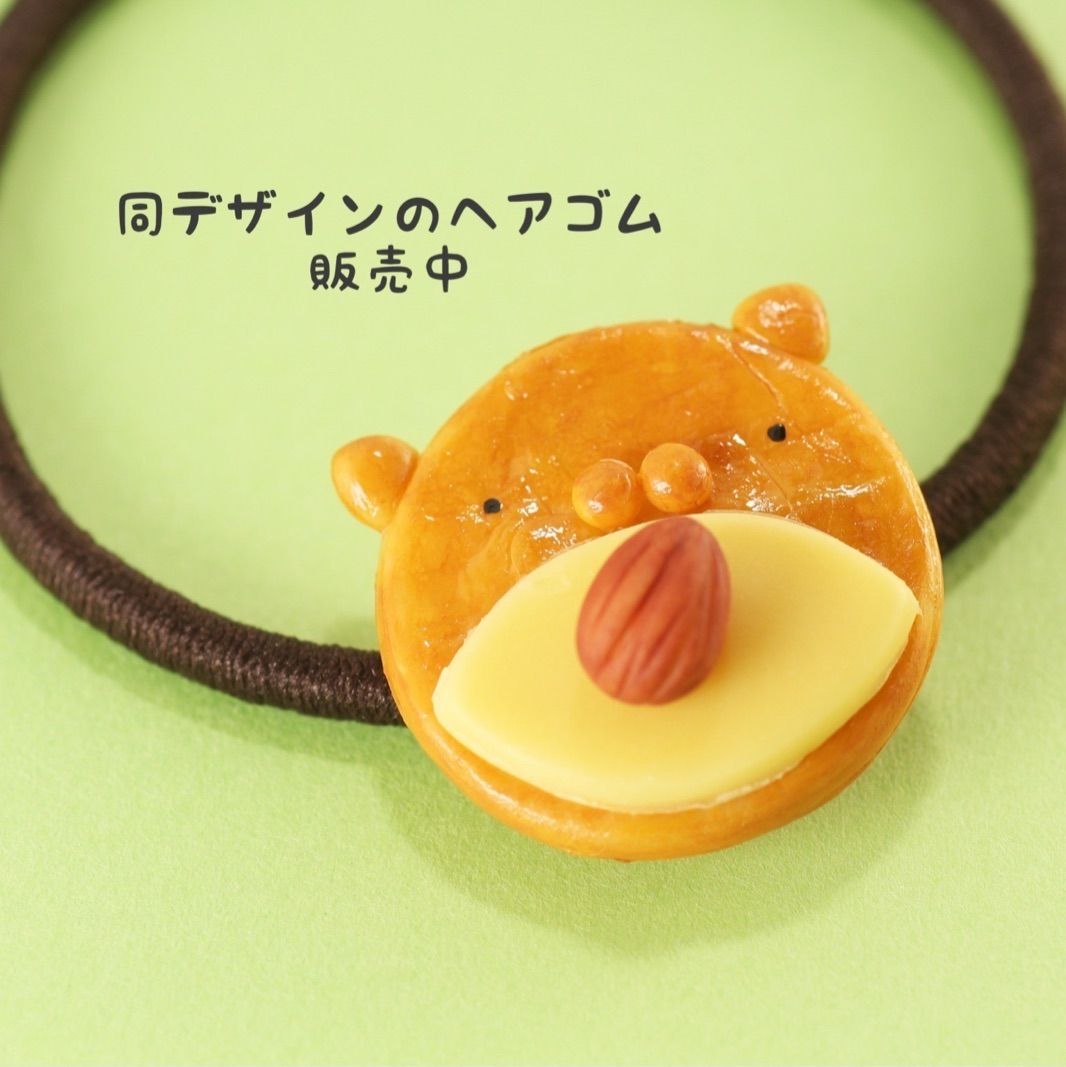 ねこのチーズおかきピアス - メルカリ