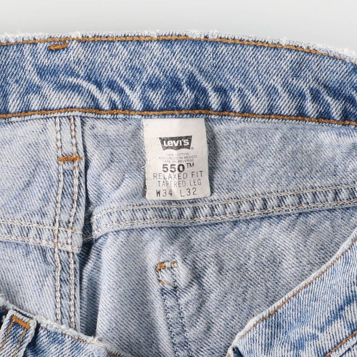 テーパードデニムパンツ