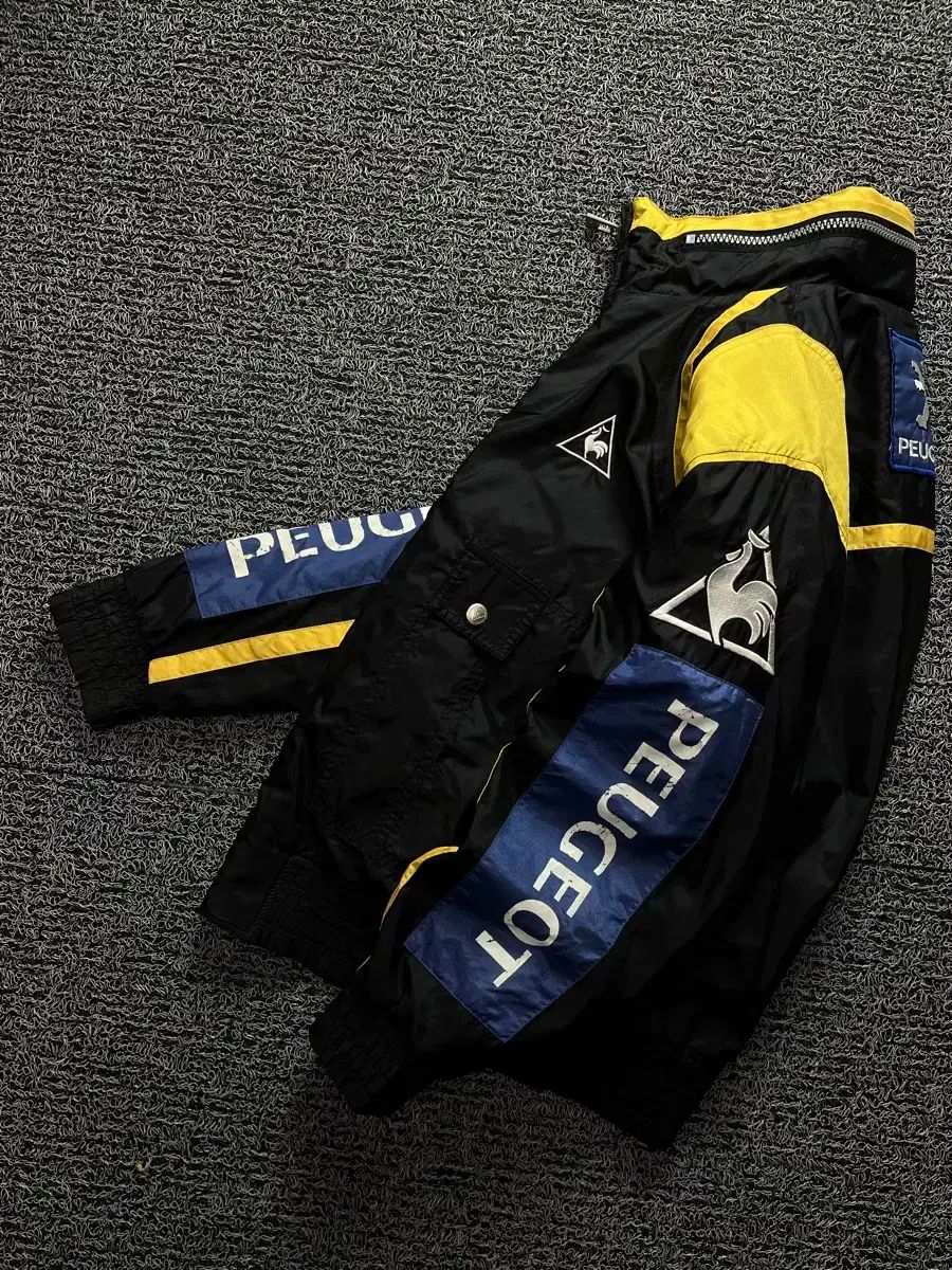 le coq sportif ルコックスポルティフ プジョー スポンサー ナイロン レーシング ジャケット