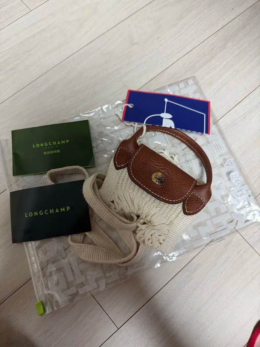 Longchamp ロンシャン または ル プリアージュ ミニ トップハンドル 販売