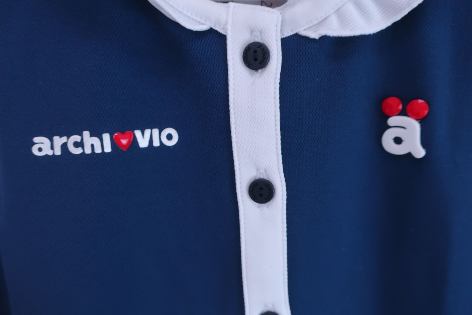 アルチビオ36ポロシャツ　未使用 美品】archivio(アルチビオ) フリルポロシャツ ネイビー